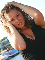 Jade posing in a long skirt outdoors