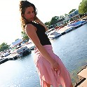Jade posing in a long skirt outdoors