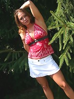 Jade on all fours in the forest