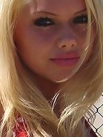 Kathy spotted on the beach in a bikini