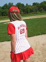 Lucy plays a game of baseball