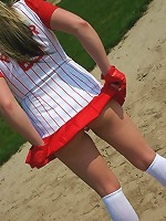 Lucy plays a game of baseball