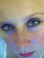 Tiny jen takes her pics on her webcam