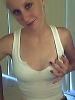 Tiny jen takes her pics on her webcam