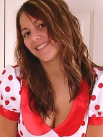 Kara in a polkadot dress with white socks and stockings