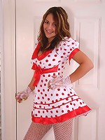 Kara in a polkadot dress with white socks and stockings