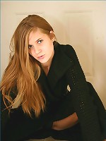 Allison in long black coat