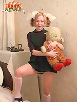 Innocent teen posing with teddy-bear