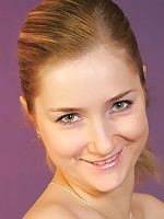 Adorable teen girl exposes her curves and spreads on the floor