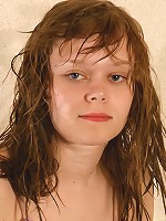 Lovely teen feels sexy and exposes her tight body