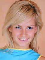 Young blond teen Alissa posing naked on the bed