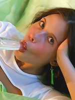 Sexy brunette stuffs her tight pussy with thick dildo