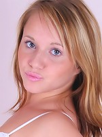 Sexy blonde girl gets naked and spreads in her bed