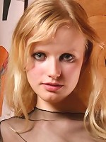 Pretty girl removes her fishnet top and panties exposing her pussy