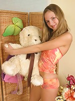 Blond hottie taking off her tiny teenie outfit