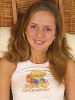 Sweet teenie takes off her top and shows her breasts