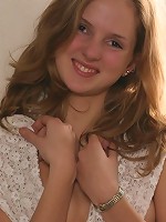 Beautiful teen poses topless and exposes her butt