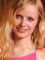 Blond cutie taking off her pink top and exposing her small round boobies