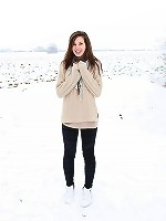 Large snowball throwing teenager