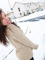 Large snowball throwing teenager