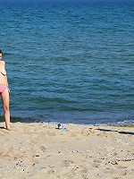 Girls fooling around on the beach
