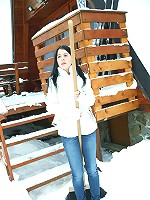 A snow shoveling teen goes inside