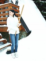 A snow shoveling teen goes inside