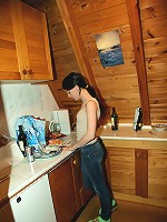 A snow shoveling teen goes inside