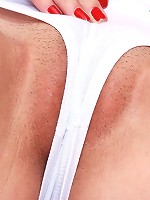 Pinching her teenage vagina lips