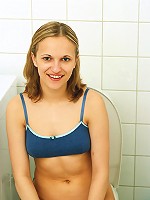 Cute teenager undressing herself