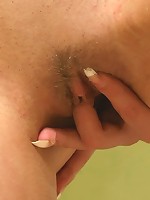 Teenage beauty rubs her wet lips