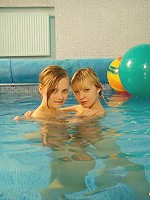 Teens swimming together in a pool