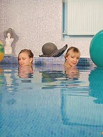 Teens swimming together in a pool
