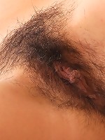 Pleasuring her soaked hairy muff