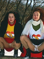 Teens in the snow rubbing pussies
