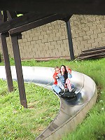 Chick sitting on his giant boner