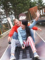 Chick sitting on his giant boner