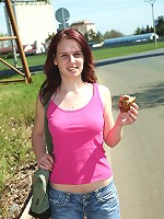 Daring teen strokes pussy outside