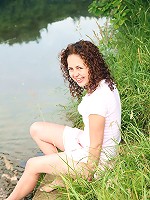 Chick washing herself in a river