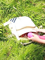 Teens finding a basket of dildos