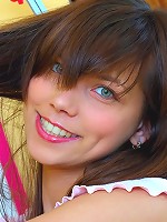 Blue eyed beauty caressing boobs