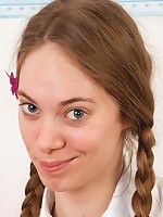 Demure horny teenager masturbates