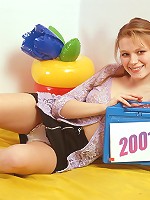 Horny beauty with a yellow dildo