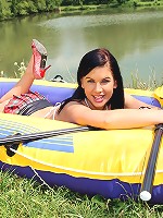 Horny girl rubbing in rubber boat