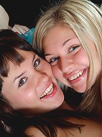 Adorable horny lesbians fondling