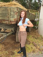 Cutie masturbating on a big farm