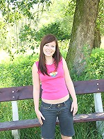 Horny girl masturbates on a bench