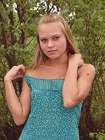 Chick masturbating in the forest