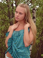 Chick masturbating in the forest