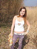 Cutie fondling her pussy outside